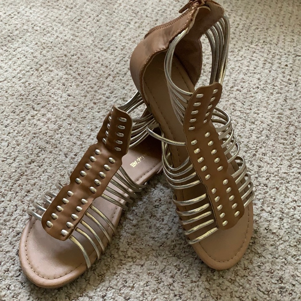 Silver and tan children’s size 3 sandals.